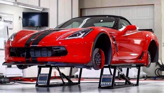 quickjack-5000tlx-portable-car-lift-fully lifted