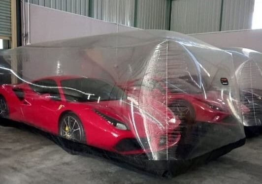 Three Ferraris in the Car Bubble Capsule