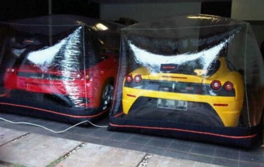 Two Ferraris in their Car Bubble Capsule cover